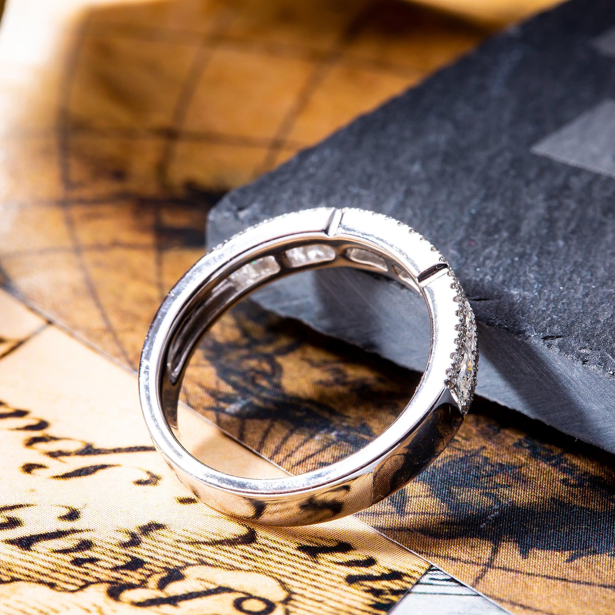 18K White Gold Ring with 0.64 CT Baguette And Round Diamonds